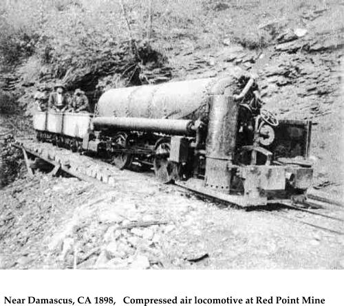 Near Damascus, CA 1898,   Compressed air locomotive at Red Point Mine